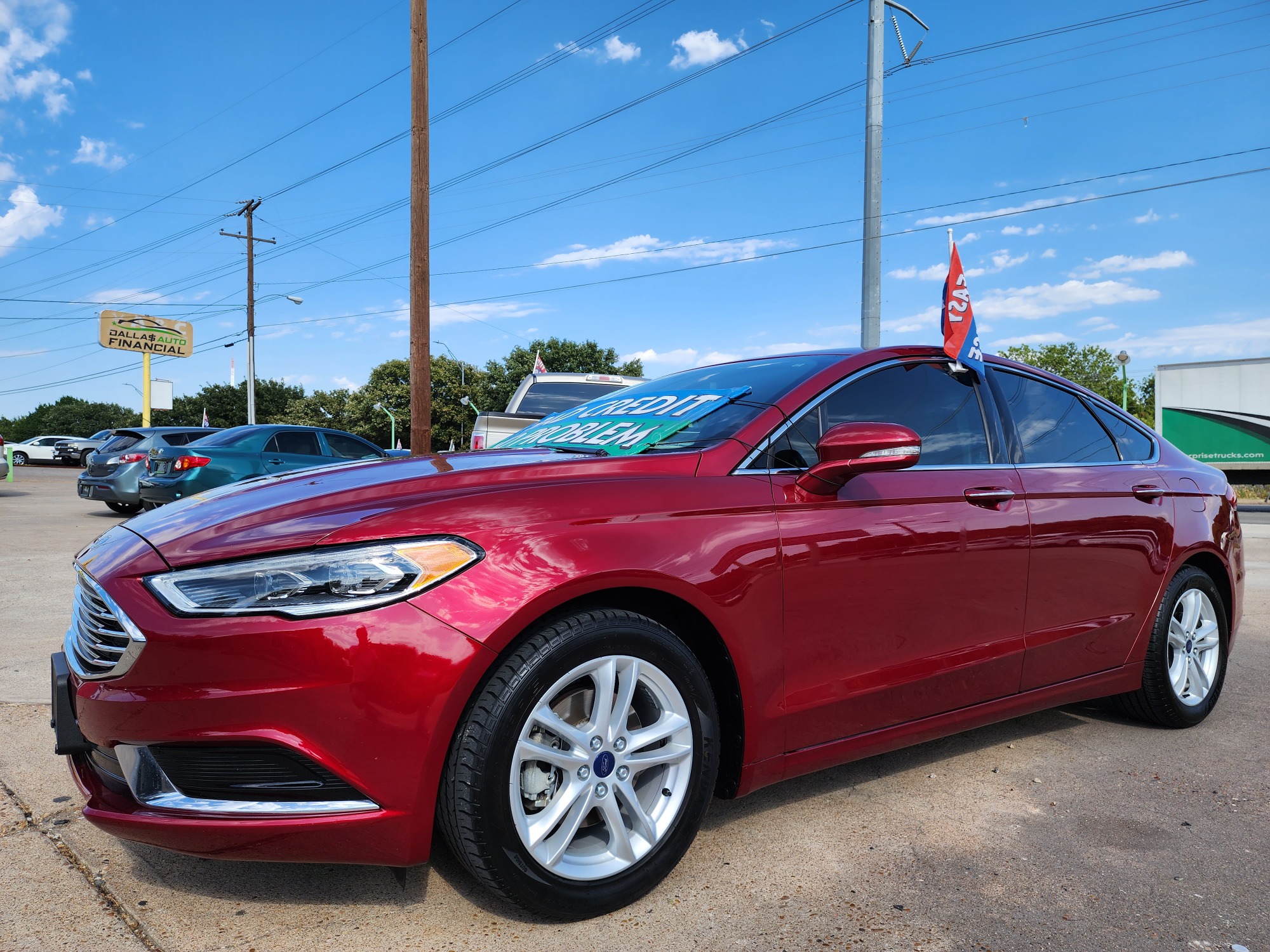 2018 RED Ford Fusion SE (3FA6P0HD2JR) with an 1.5L L4 DOHC 16V engine, 6A transmission, located at 2660 S.Garland Avenue, Garland, TX, 75041, (469) 298-3118, 32.885551, -96.655602 - Welcome to DallasAutos4Less, one of the Premier BUY HERE PAY HERE Dealers in the North Dallas Area. We specialize in financing to people with NO CREDIT or BAD CREDIT. We need proof of income, proof of residence, and a ID. Come buy your new car from us today!! This is a 2019 FORD FUSION SE SEDAN! - Photo #7